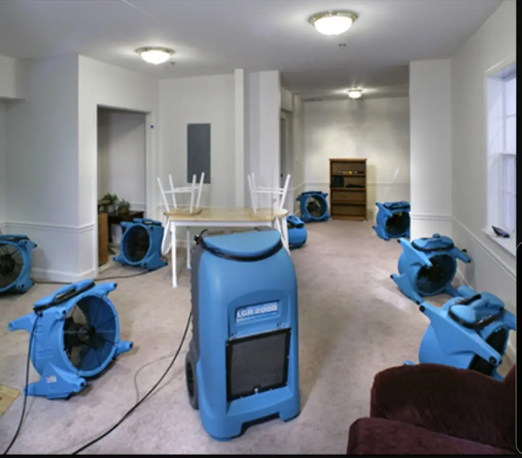 Air movers and dehumidifier setup for Water Damage Restoration in Kingsford